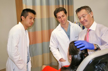 Dr. Serletti demonstrating a cosmetic services procedure to residents